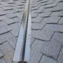 Photo by benjaminbrumfield.com - Signs Your Open Valley Flashing Is Clogged with Debris and Backing Up Water