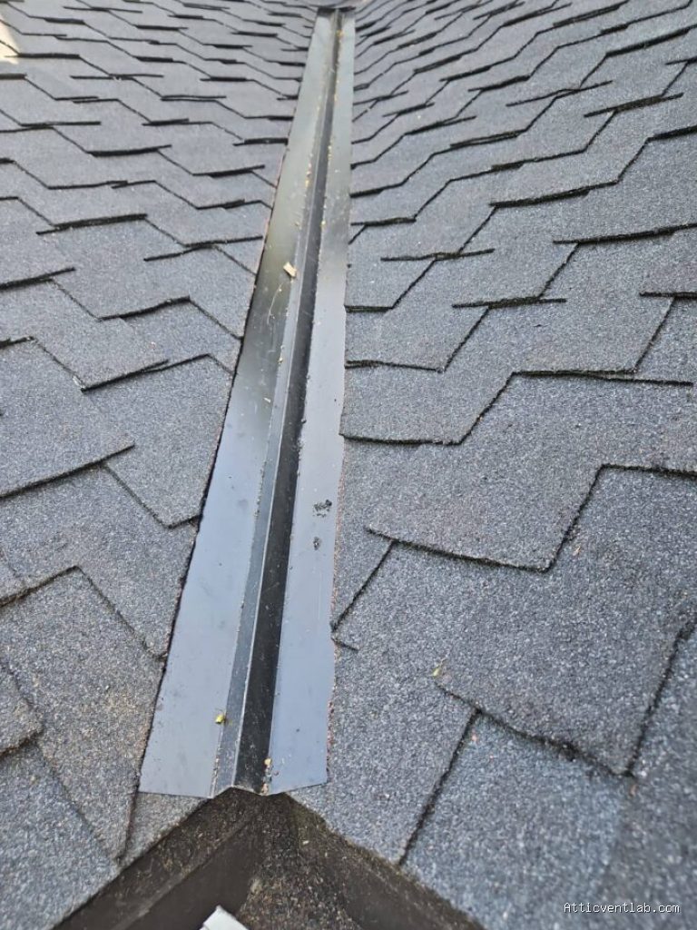 Photo by benjaminbrumfield.com - Signs Your Open Valley Flashing Is Clogged with Debris and Backing Up Water